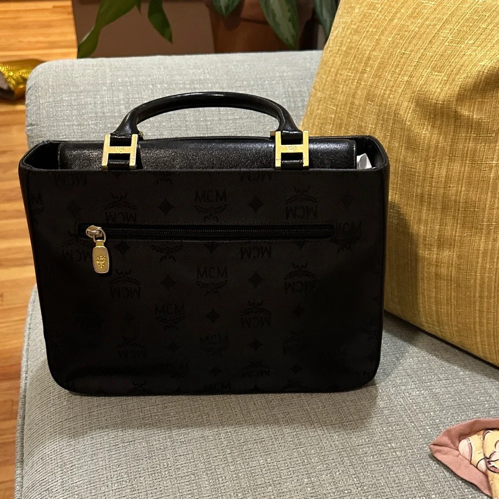 MCM Black Leather hand bag with Gold Accents. Made in Germany